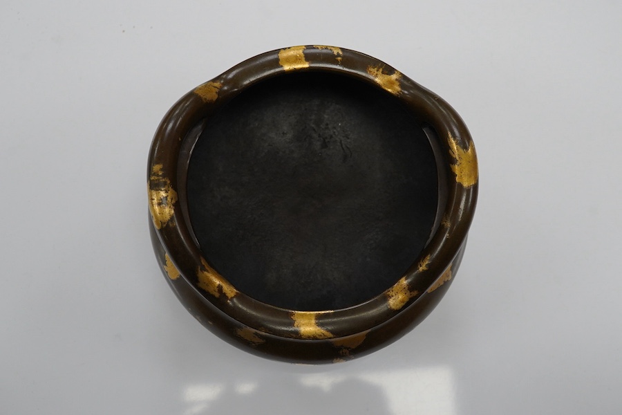 A Chinese gold splash bronze censer, Xuande seal mark to underside, 11cm wide. Condition - good